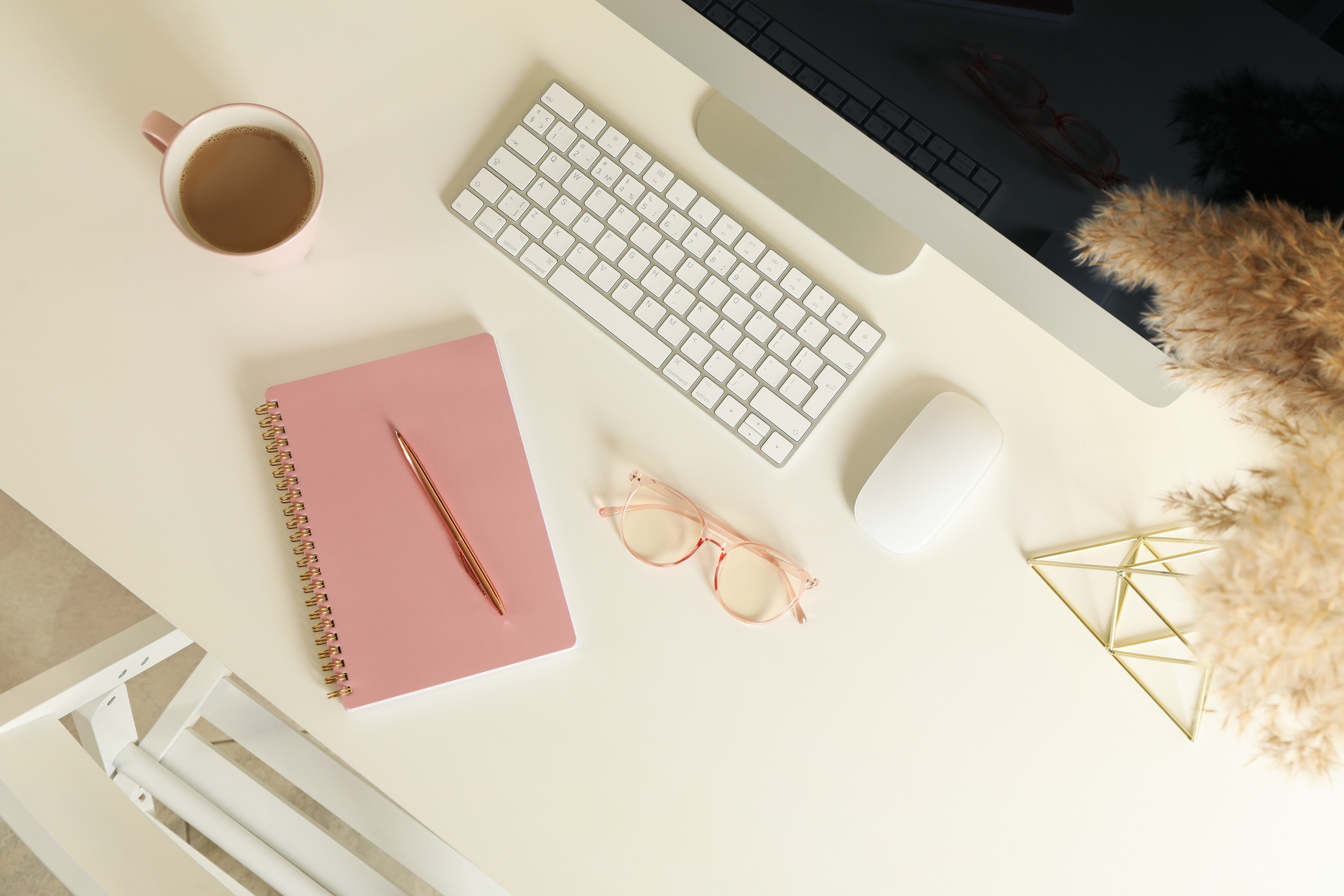 Top View of Minimalist Workspace with Computer and Coffee